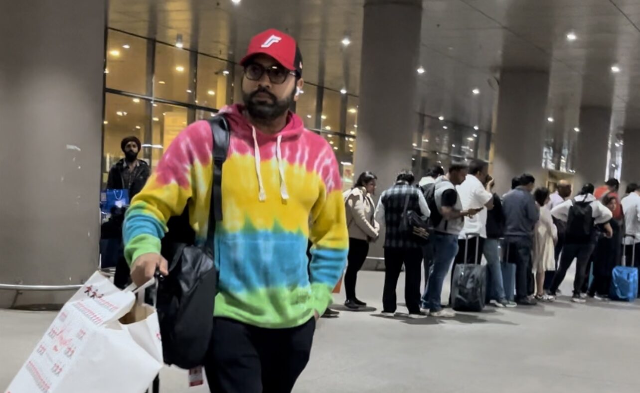 Rohit Sharma’s Runway: A Stylish Touchdown at Mumbai Airport in Vibrant Hoodie Glam